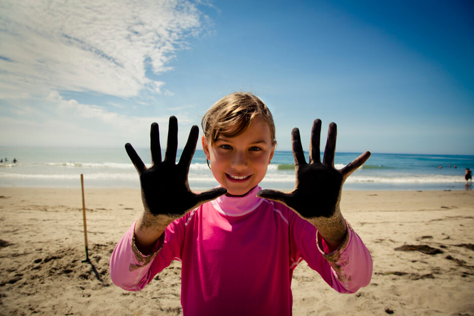 Devyn with her charcoal covered hands.
